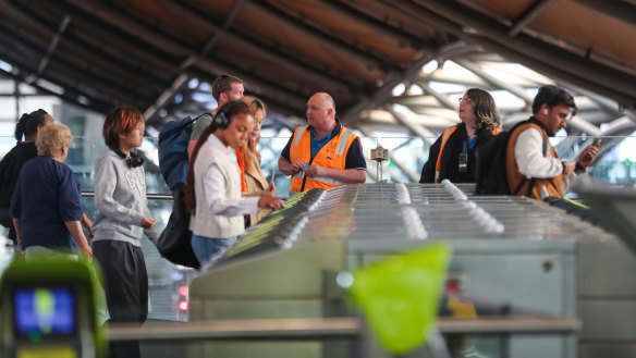 Metro Trains customer service staff working at Southern Cross Station March 2024.