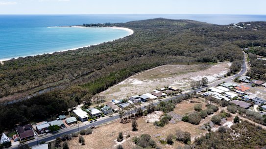 Aerial view of the razed site for a new development that will become the only visible building above the sand dunes at Main Beach in the small holiday town of South West Rocks, NSW. 30 November 2023 Photo: Janie Barrett