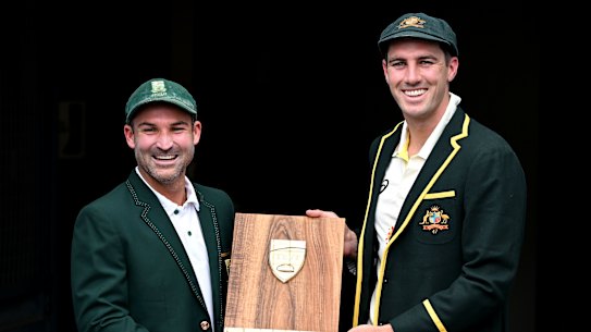Pat Cummins and Dean Elgar with the unnamed trophy for the Australia-South Africa series.