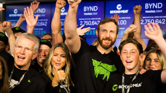 Ethan Brown, founder and chief executive officer of Beyond Meat, center, celebrates with his wife Tracy Brown, center left, and guests during the company's IPO at the Nasdaq MarketSite in New York.
