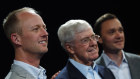 Charles Koch, chief executive officer of Koch Industries, centre, with his son, Chase Koch, front, and Brian Hooks, chief executive officer of Stand Together.