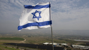 An Israeli flag flies in a Jordan Valley Jewish settlement.