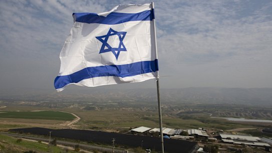 An Israeli flag flies in a Jordan Valley Jewish settlement.