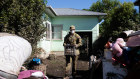 Members of the ADF help locals to clear their flood damaged homes in Broadwater.