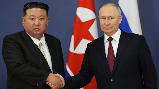 Russian President Vladimir Putin shakes hands with North Korean leader Kim Jong-un in Russia in September.