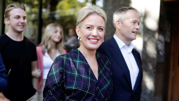 Chloe Shorten and Opposition Leader Bill Shorten depart after a visit to the Salvation Army's Lighthouse Cafe in Melbourne.