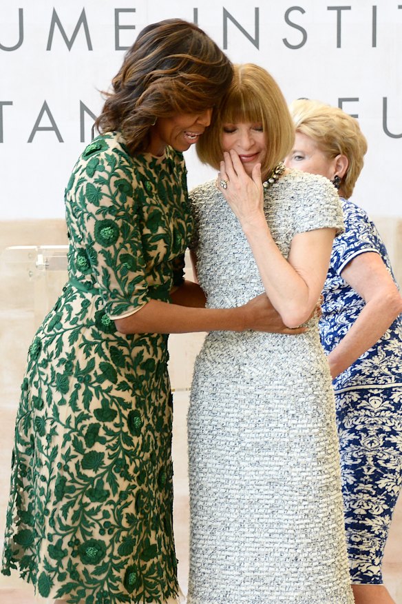 Michelle Obama and Anna Wintour at the grand opening of the Costume Centre at the Metropolitan Museum of Art (2014). Obama appeared on the cover of Vogue three times.