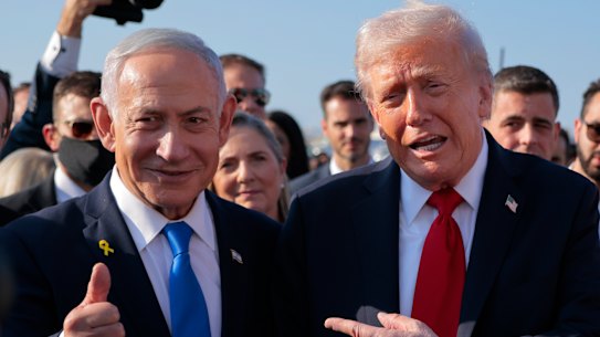 TEL AVIV, ISRAEL - OCTOBER 13:  U.S. President Donald Trump speaks to Israeli Prime Minister Benjamin Netanyahu at Ben Gurion International Airport before boarding his plane to Sharm El-Sheikh, on October 13, 2025 in Tel Aviv, Israel. President Trump is visiting the country hours after Hamas released the remaining Israeli hostages captured on Oct. 7, 2023, part of a US-brokered ceasefire deal to end the war in Gaza. (Photo by Chip Somodevilla/Getty Images)