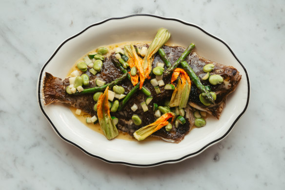 Grilled whole flounder with buttered greens at Bannisters, Soldiers Point. 