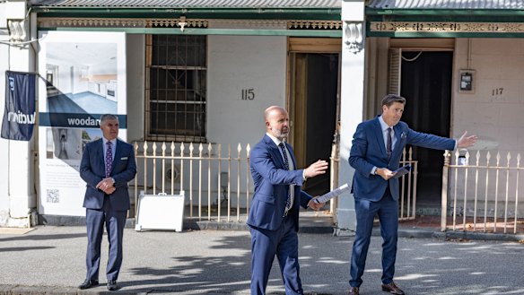 Rundown Carlton terraces fetch $1.7 million at auction