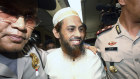 Umar Patek is escorted to court in Jakarta in 2011.