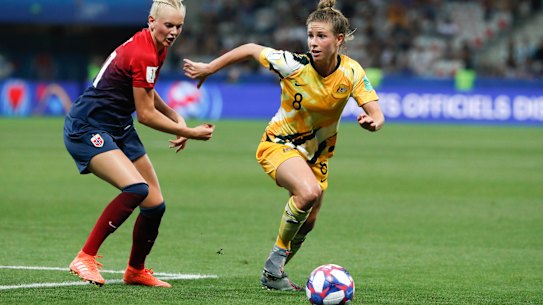 Elise Kellond-Knight vies for the ball with  Norway’s Karina Saevik during the during the Women’s World Cup in 2019.