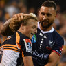 Niggle and giggle: Quade Cooper lets Joe Powell know he's back in Super Rugby.