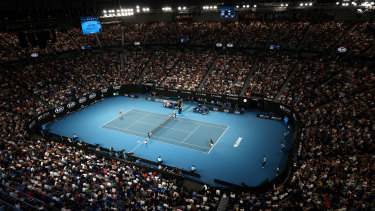 Fans watch Roger Federer and John Millman in action on Rod Laver Arena at this year's Australian Open. All tournaments during the forthcoming Australian summer could yet be played in Melbourne due to the coronavirus. 