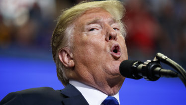 President Trump mocked Dr Christine Blasey Ford at a rally in Mississippi.