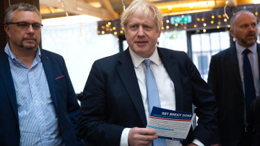 British Prime Minister and Conservative Party leader Boris Johnson, centre, on Wednesday.