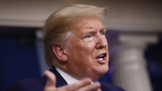 President Donald Trump speaks during a briefing at the White House on Saturday in Washington.