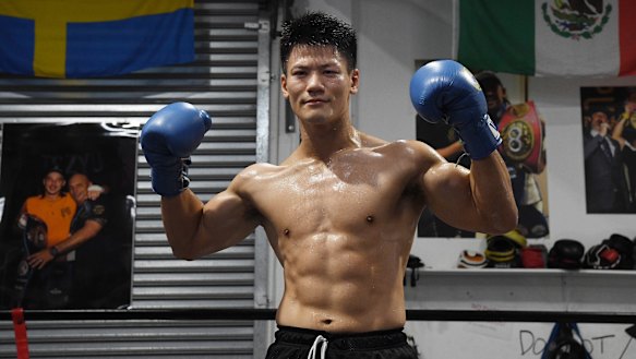 Takeshi Inoue shows off his chiselled physique at Bondi Boxing Gym on Tuesday.