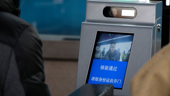 The screen displays “Verification is made. Please open the gate after collecting ID card”.