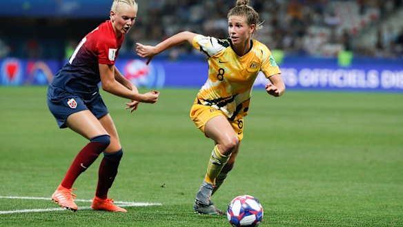 Elise Kellond-Knight takes on Norway’s Karina Saevik during the World Cup in 2019.