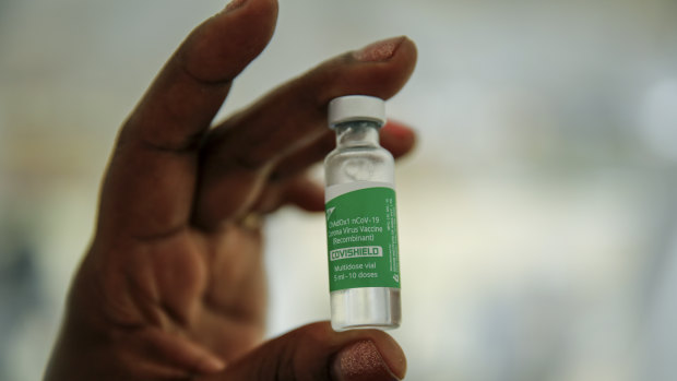A nurse holds a vial of the AstraZeneca COVID-19 vaccine manufactured by the Serum Institute of India and provided through the global COVAX initiative to other countries.