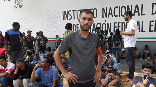 Rahjit, from India, waits to register his entry into Mexico, along with thousands from Nigeria, Cameroon, Bangladesh, Haiti and Cuba who travelled across oceans, jungles and mountains, up through Central America to get closer to the US. 