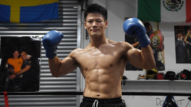 Takeshi Inoue shows off his chiselled physique at Bondi Boxing Gym on Tuesday.