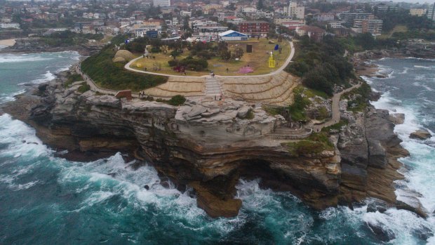 Aerial view of Marks Park, the dress circle vantage point of Sculpture by the Sea at Bondi, rimmed by the offending concrete path, for possibly the last time.
