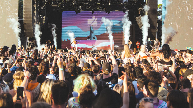 A crowd listens to music at FOMO festival in 2019.