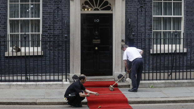 The red carpet is rolled out outside 10 Downing Street.