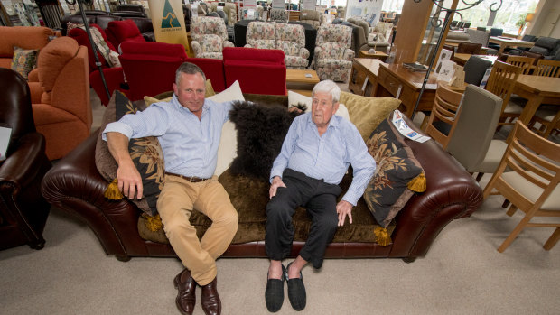 Peter Cusack and his father David, 88, in the Fyshwick showroom of Cusacks Furniture.