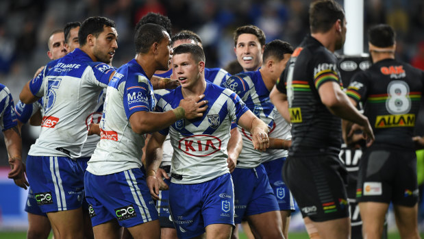 Blunted: The Panthers concede another try to the Bulldogs as they dropped out of the eight.