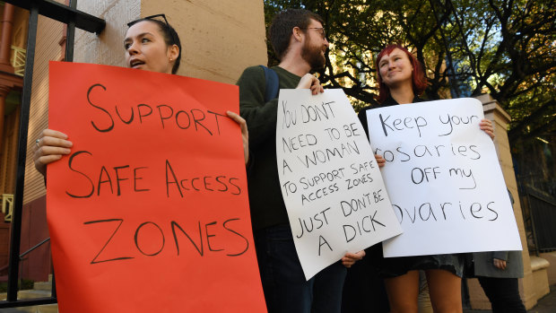 Demonstrators in favour of no-go zones around NSW abortion clinics stand outside NSW State Parliament last week. 