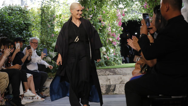 Designer Maria Grazia Chiuri accepts applause at the end of the Dior Haute Couture Fall-Winter 2020 fashion collection presented in Paris on Monday July 1, 2019. 