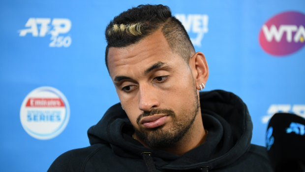 Slipping: Nick Kyrgios isn't too fussed after crashing out of the world's top 50 with his Brisbane International loss.