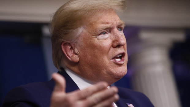 President Donald Trump speaks during a briefing at the White House on Saturday in Washington.