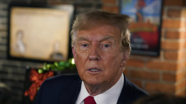 Former president Donald Trump talks to supporters in Davenport, Iowa. 