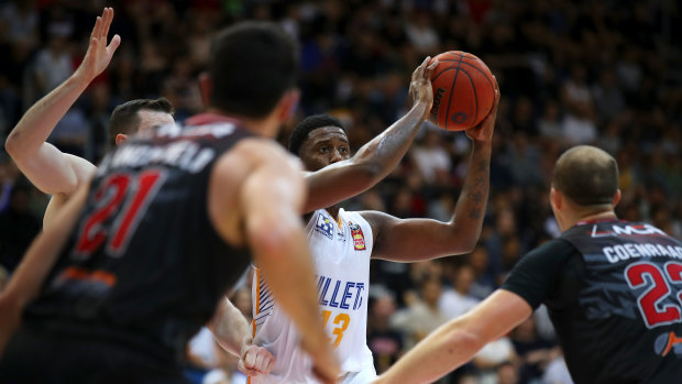 Lamar Patterson of the Bullets looks to pass during the round five NBL match against the Hawks at AIS Arena in Canberra.