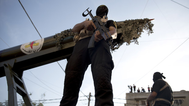 Palestinian members of the military wing of the Islamic Jihad group march in the streets of Gaza in early October.