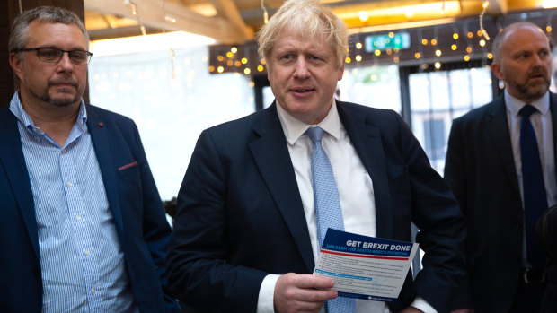 British Prime Minister and Conservative Party leader Boris Johnson, centre, on Wednesday.