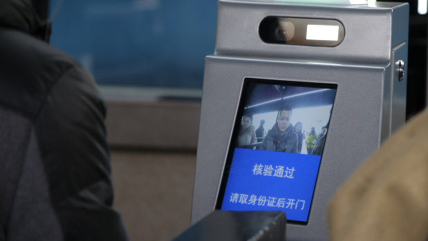 The screen displays “Verification is made. Please open the gate after collecting ID card”.