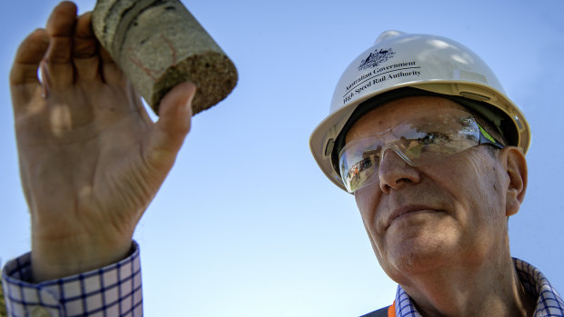 High Speed Rail Authority CEO Tim Parker with a core sample taken in Newcastle as part of work to prepare a business case for the proposed fast-train from Sydney.  