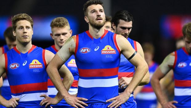 Marcus Bontempelli and his Western Bulldogs teammates following their loss to Port Adelaide at Marvel Stadium.