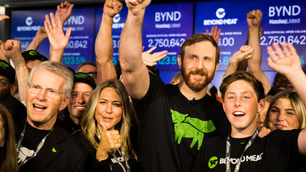 Ethan Brown, founder and chief executive officer of Beyond Meat, center, celebrates with his wife Tracy Brown, center left, and guests during the company's IPO at the Nasdaq MarketSite in New York.