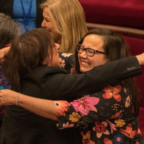 Members of the Victorian Upper house celebrate with hugs and tears of joy after a marathon 29 hours sitting to pass the Voluntary Assisted Dying Bill in November 2017. 