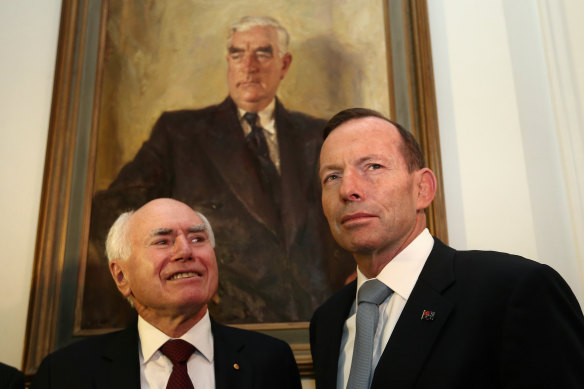 Former prime ministers Tony Abbott and John Howard have been banned indefinitely from entering Russia. 