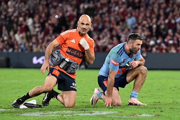 Blues fullback James Tedesco was concussed after a clash of heads.