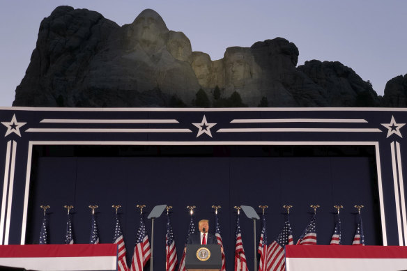 In the shadow of greats: US President Donald Trump speaks at Mount Rushmore National Monument on July 3.