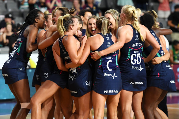The Melbourne Vixens celebrate winning this year's Super Netball championship.