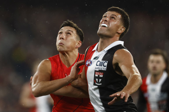 Sam Weideman of the Bombers and Rowan Marshall of the Saints.